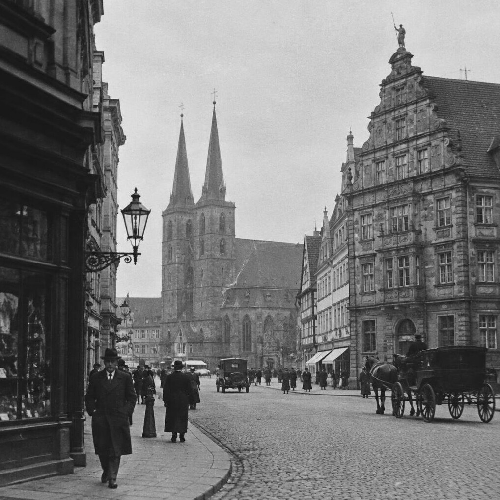 Black and white historical photograph of a German city street